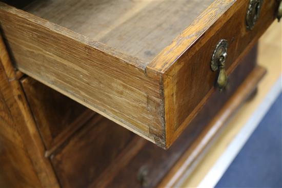 An 18th century walnut chest of three long and two short drawers W.87cm